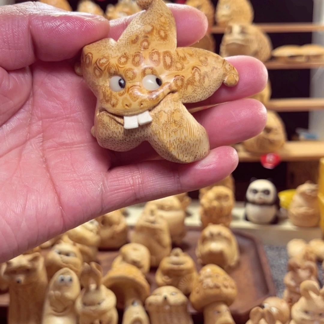 竹竹根雕海星手把件