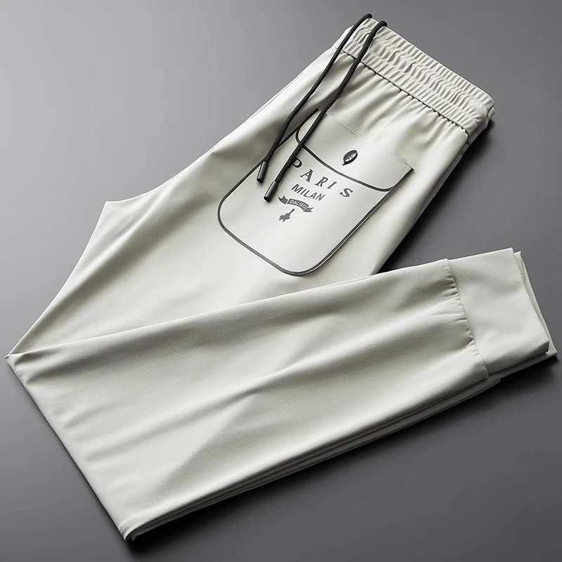 休闲运动裤男夏季薄款无痕冰丝速干条纹修身字母印花压胶束脚卫裤