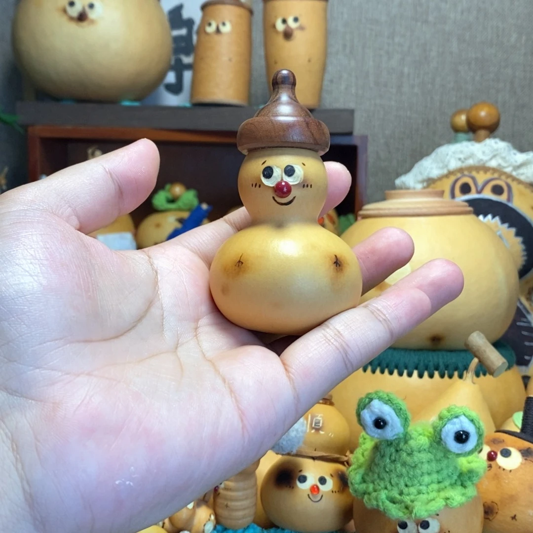 红鼻子木奶嘴手捻摆件