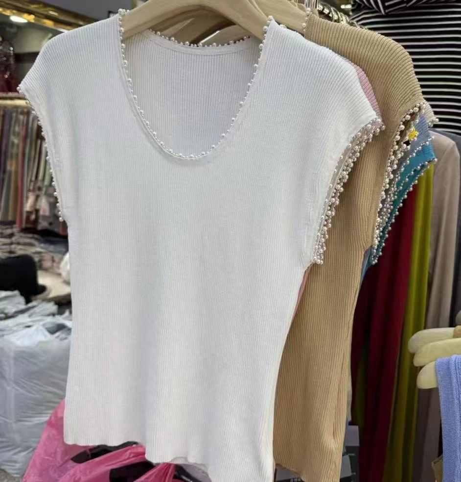 领口袖口小珍珠感觉的针织背心 黑白两色入哦