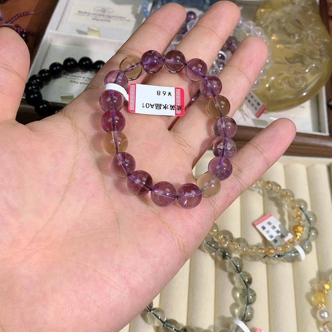 宇***志水晶手链未镶嵌紫黄水晶手链