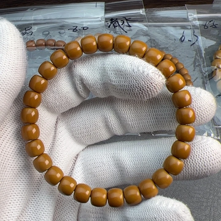 早***起橄榄核吊坠老挝核尖单圈7.7mm全品