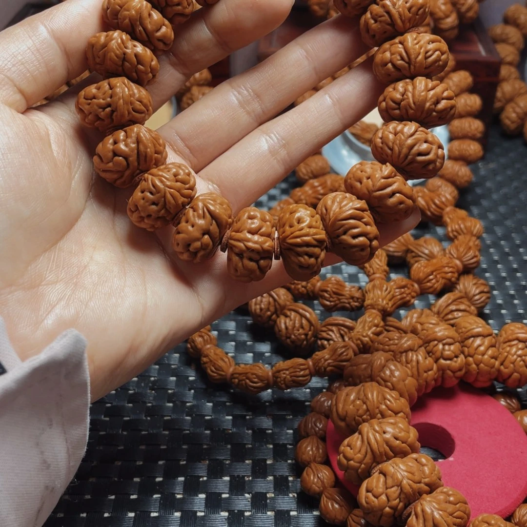 桃核手串圣***管秦岭龙纹桃核