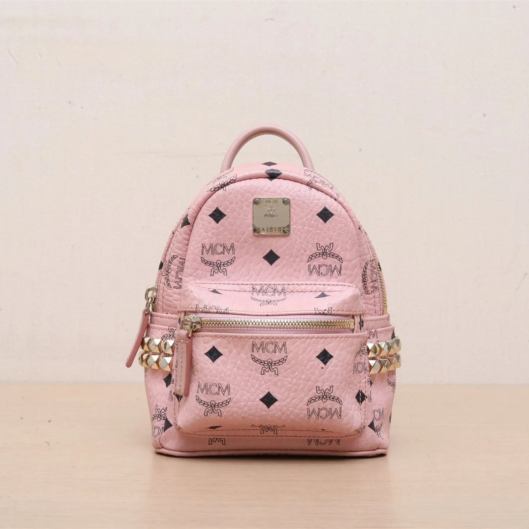 95新 MCM 【娇】侧边铆钉 双肩包 超MINI 粉色 皮革C P225992822