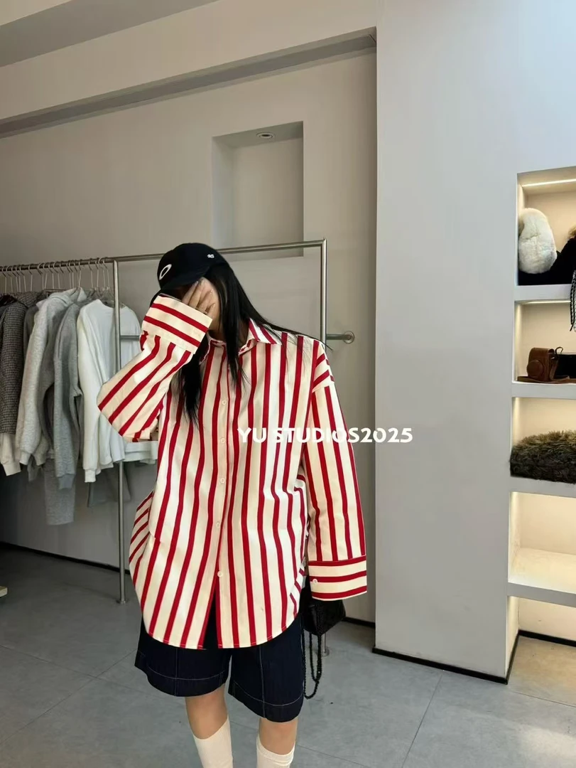 大娜小众～时尚欧韩条纹垫肩衬衣