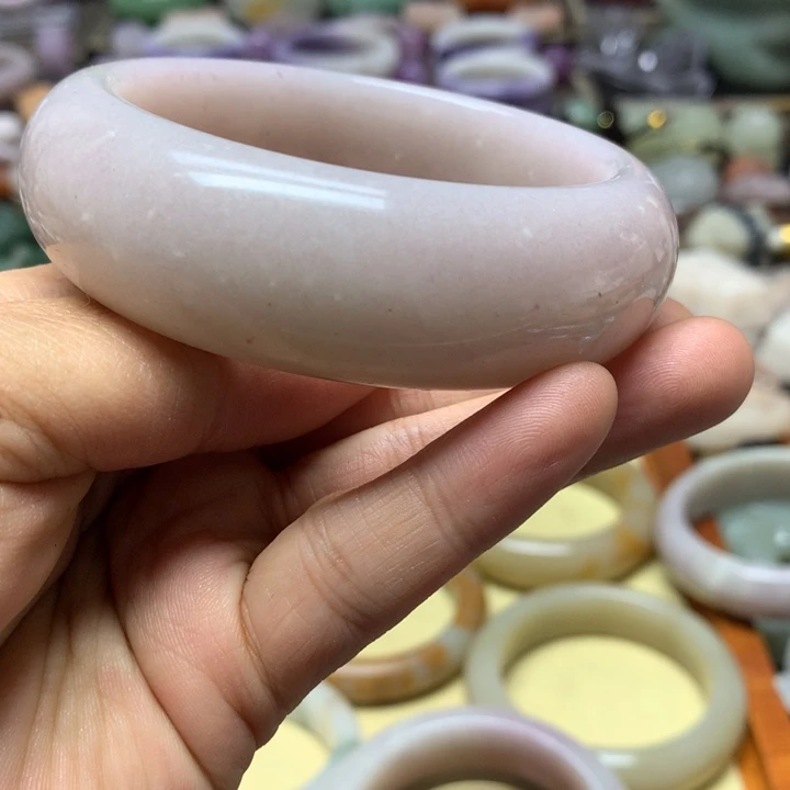 雅***淳石英岩玉未镶嵌紫玉59小轮胎，有黄，有棉