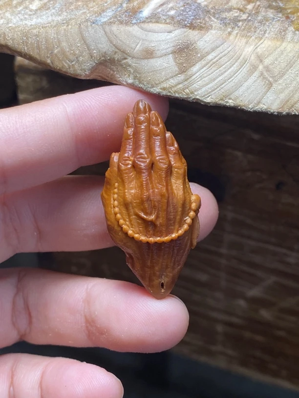 梅林橄榄核虔诚佛手单籽。尺寸2.0×4.0