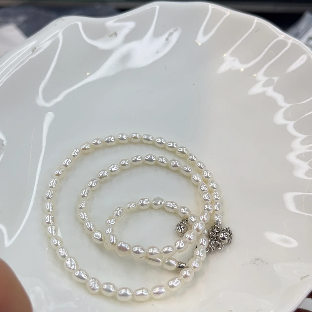 淡水珍珠银S925镶嵌耳饰