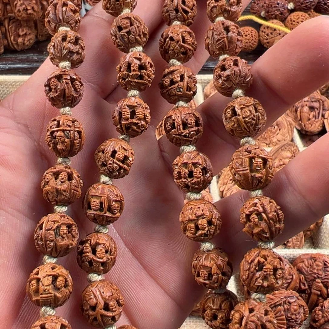 桃核手串桃核1.1精工四人雕