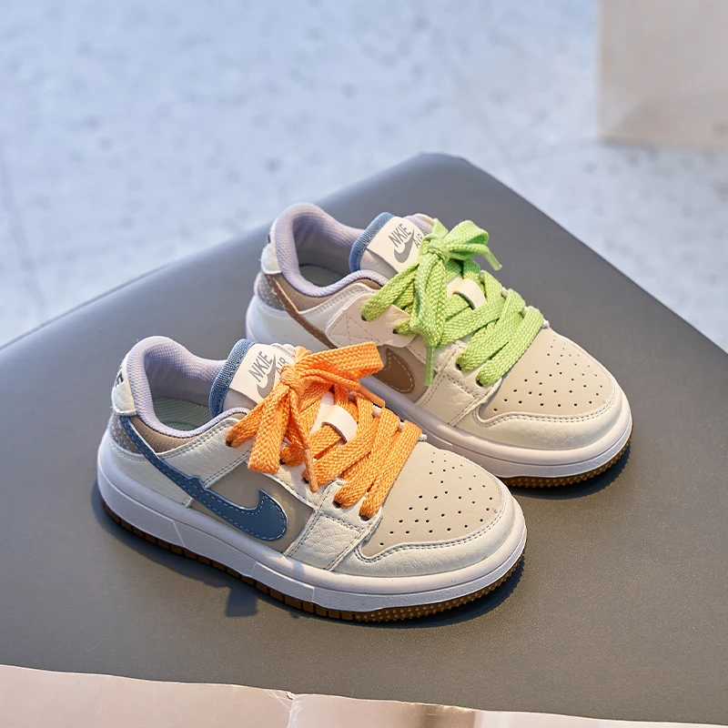 大黄蜂AJ真皮儿童板鞋2025春季新款男童休闲鸳鸯鞋软底女童低帮运