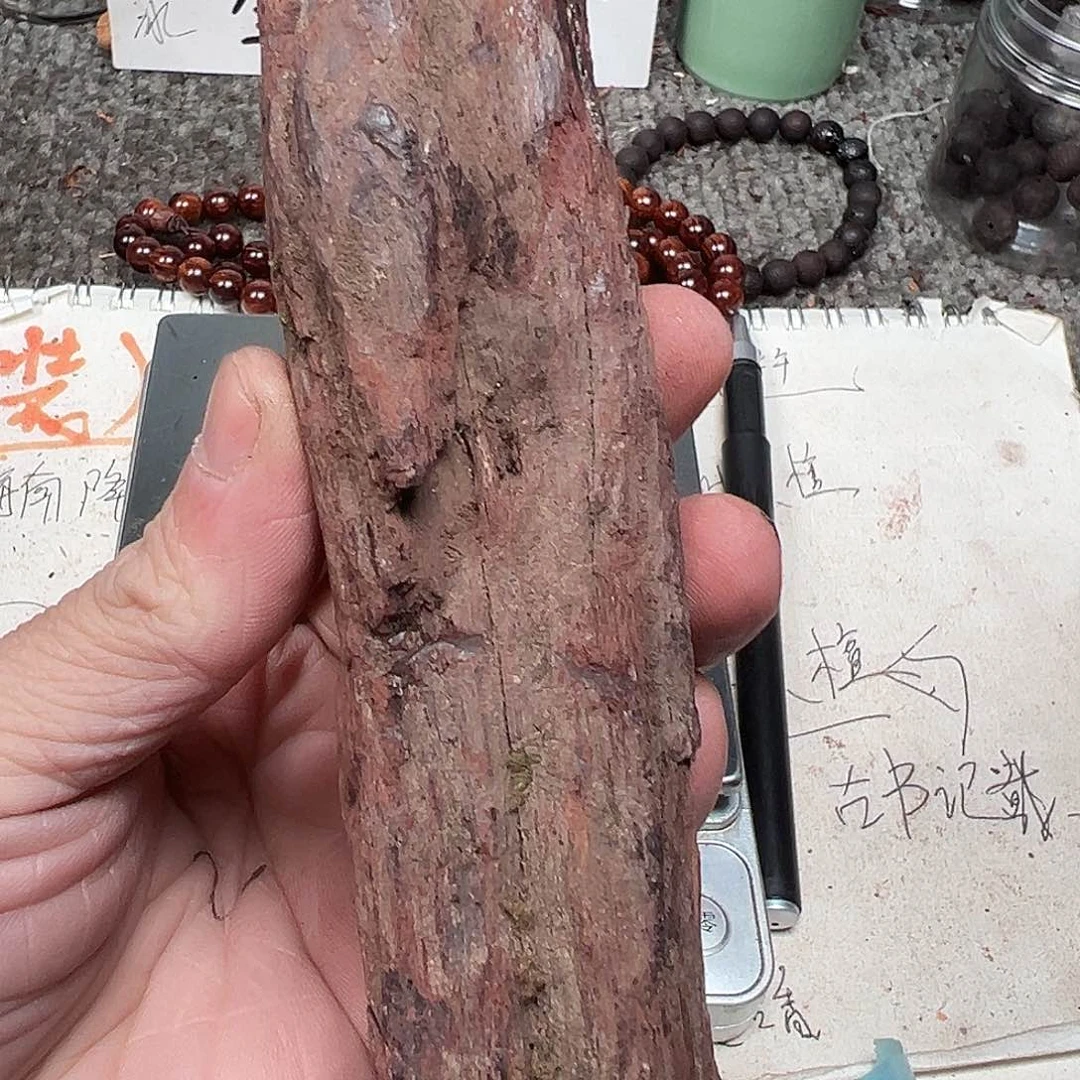 木孟*蜓本海南红降104克手把件