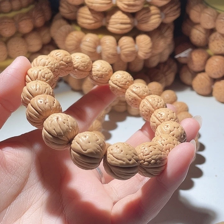 丽***利吊坠桃核桃核手串金丹40