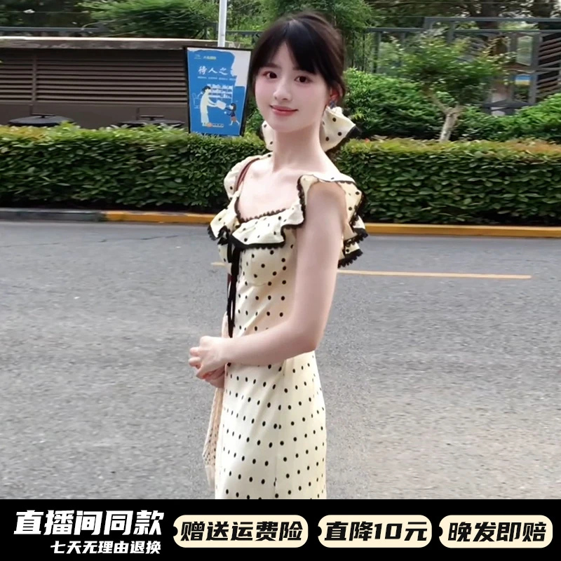 2025新款法式小飞袖白色波点吊带连衣裙子女夏季收腰包臀鱼尾长裙