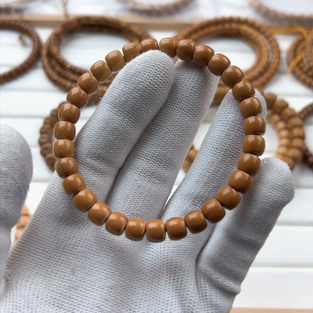 橄榄核手串灵**口7.4核尖手串保真