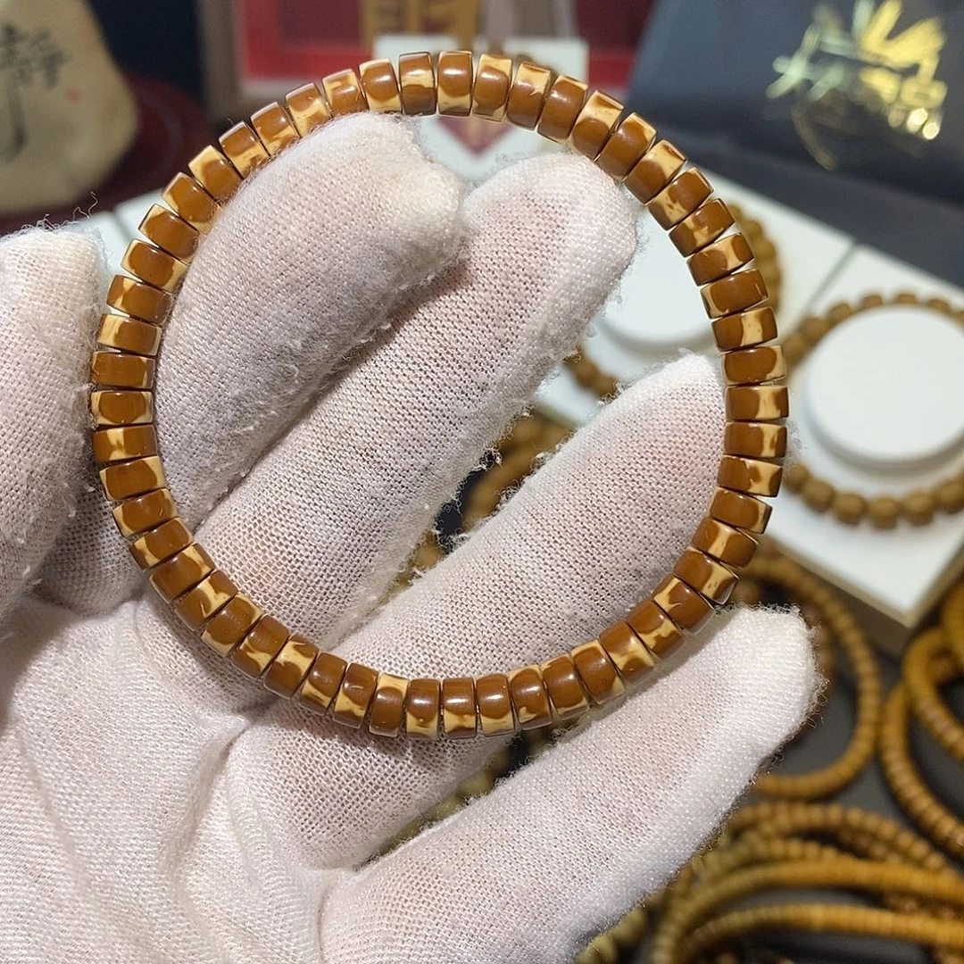还***错手串紫金鼠6*4花皮熊猫药片