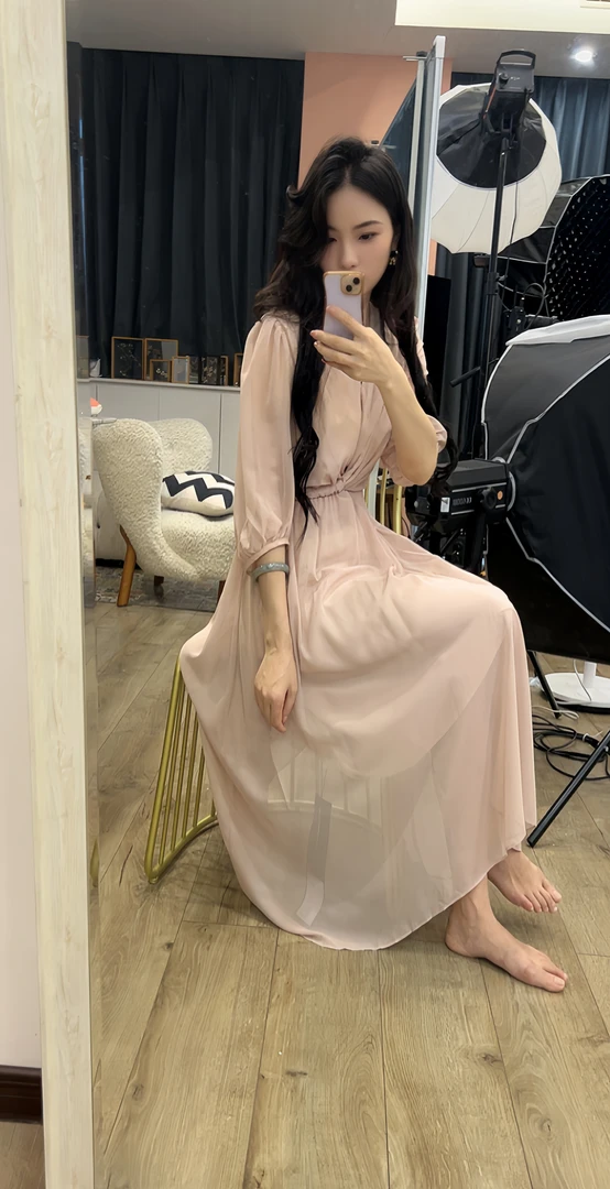 新款腰部褶皱拼接不规则裙摆连衣裙250303