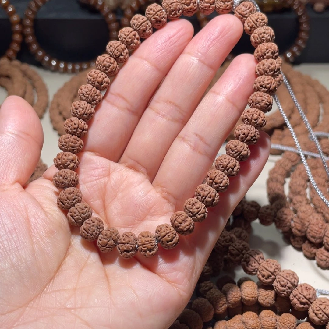 平****金刚菩提吊坠凹底梅花手串9.4