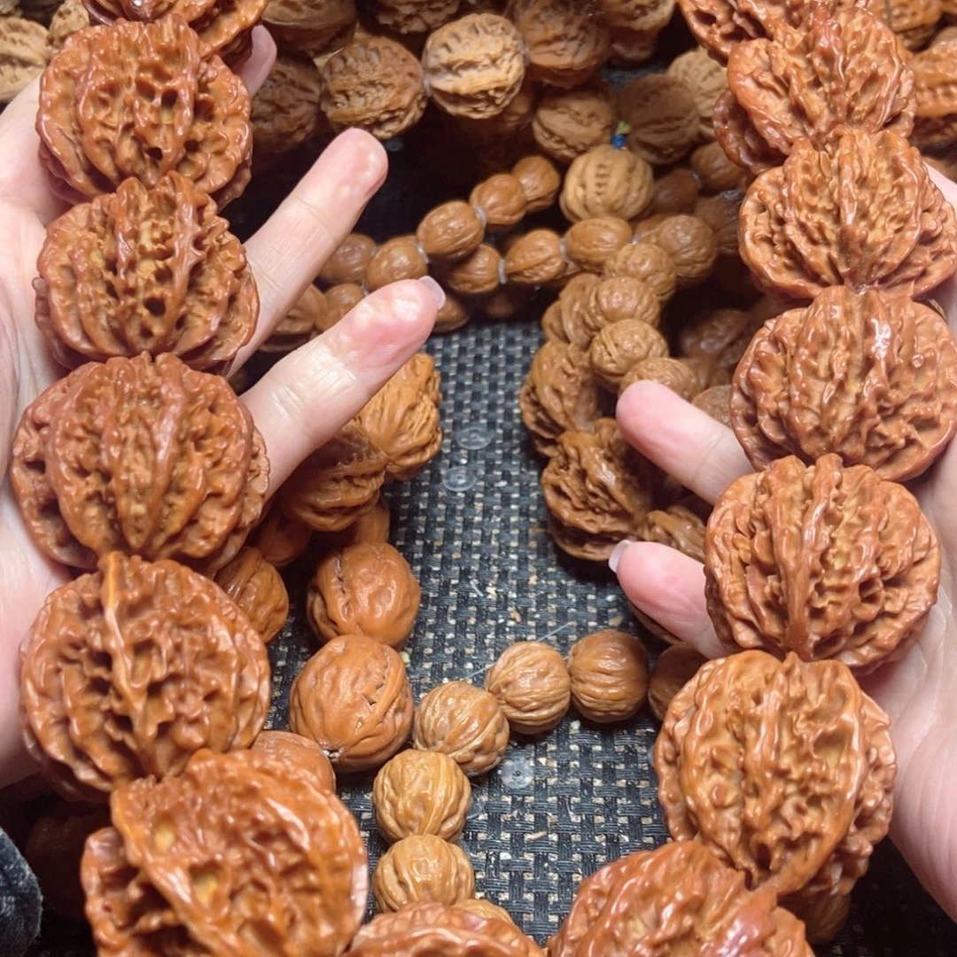 吊坠桃核粗筋麻花手持