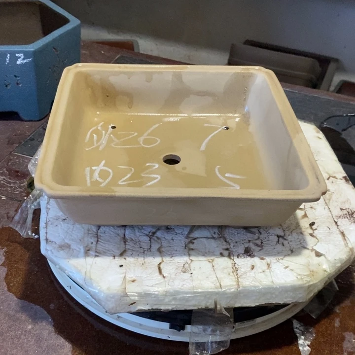 紫砂花盆自己丶小孩