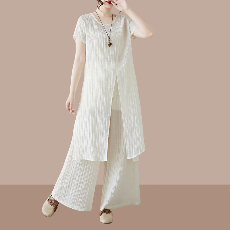 复古文艺范洋气百搭套装2025夏新款时尚不规则上衣裙裤气质两件套