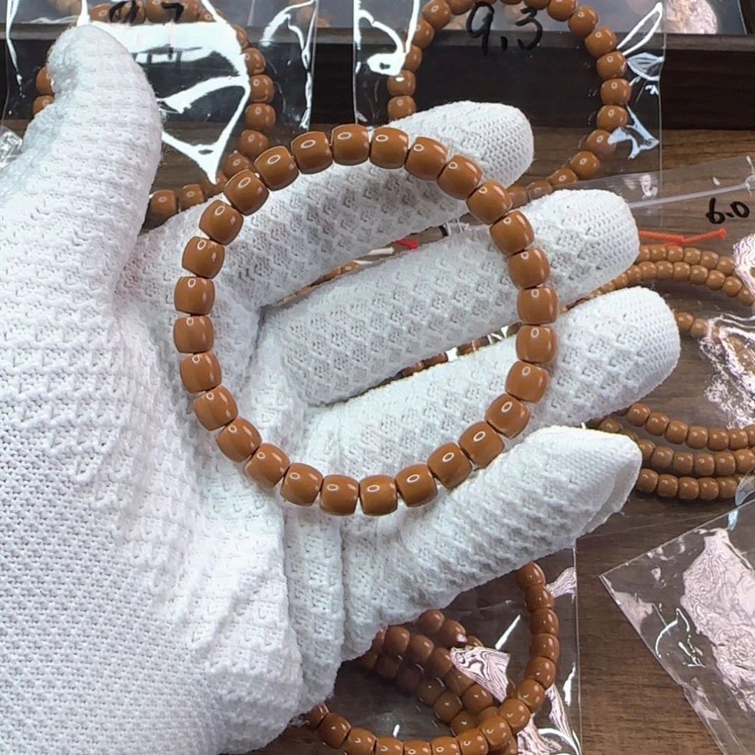 橄榄核吊坠D***?7.6mm老挝核尖直切单圈