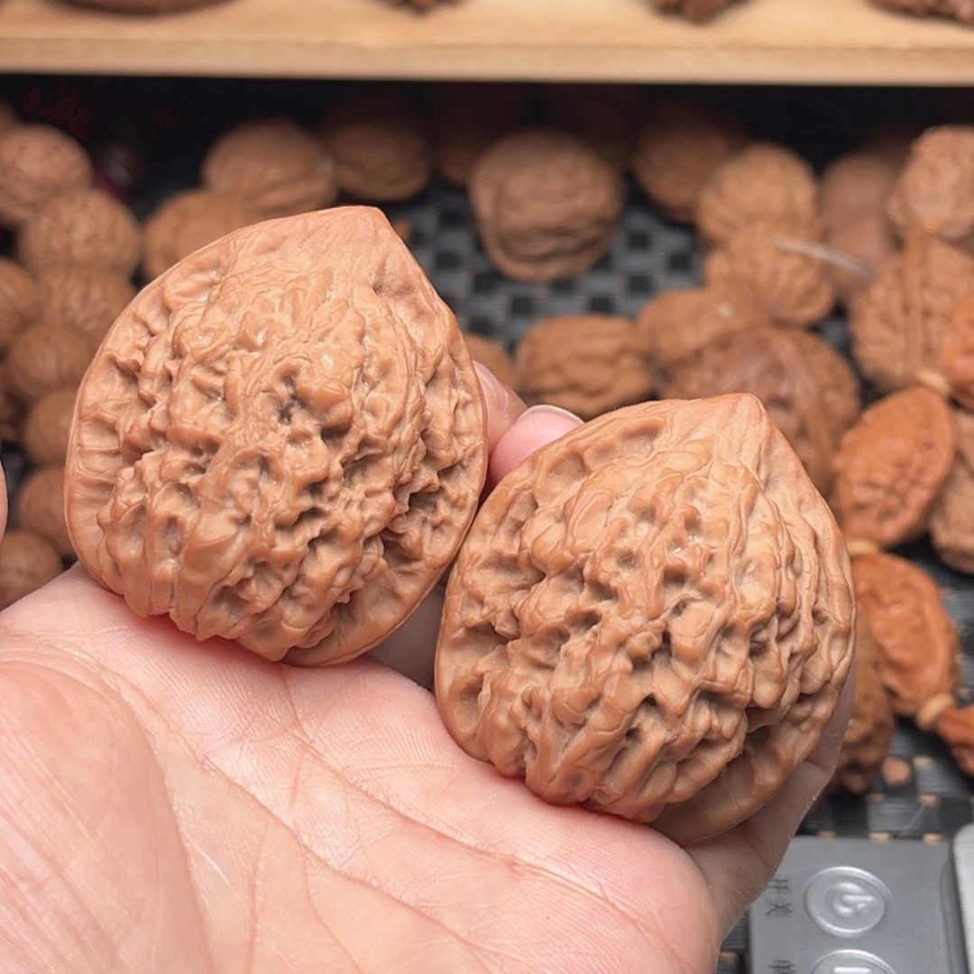 和**财文玩核桃管帽38有修尖一侧