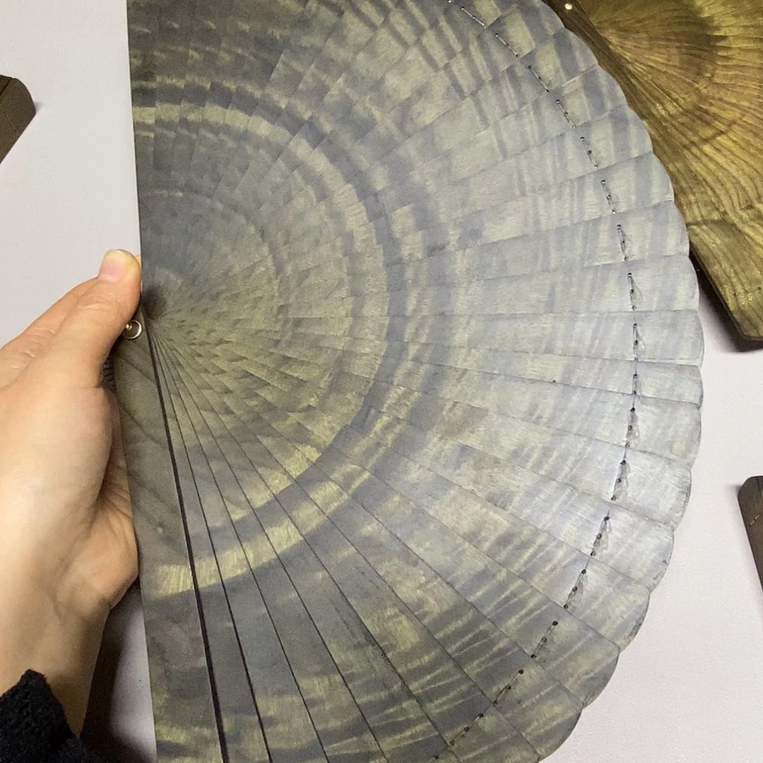 楠木1****理金丝楠木21.5水波折扇