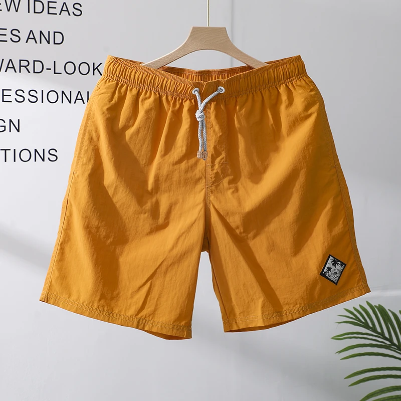 五分裤男士夏季宽松纯色皱感百搭休闲裤冰丝速干沙滩裤高级感短裤