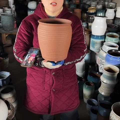 口21高24瑕疵底裂盆子。