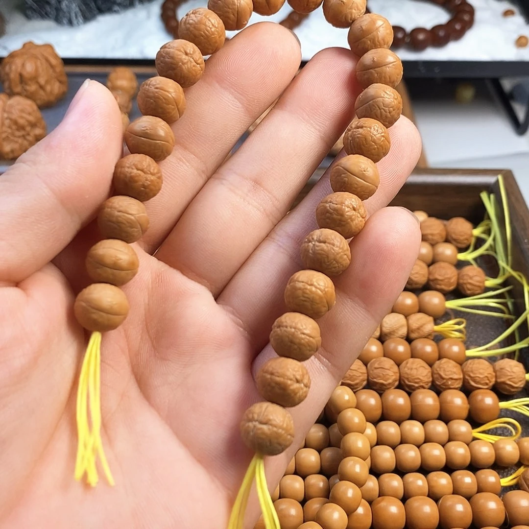 桃核吊坠瑕 款凤眼