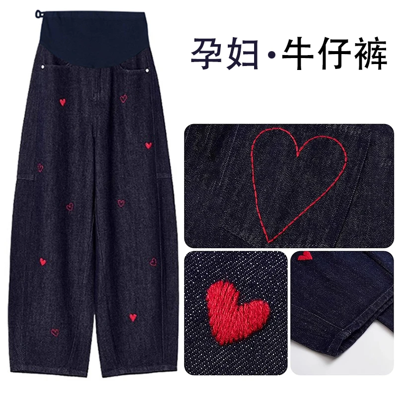 时尚孕妇牛仔显瘦韩版显瘦丹宁蓝牛仔桃心刺绣孕妇阔腿弯刀裤