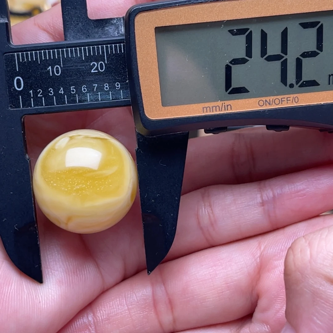 弦***乐琥珀未镶嵌裸石蜜蜡圆珠笑