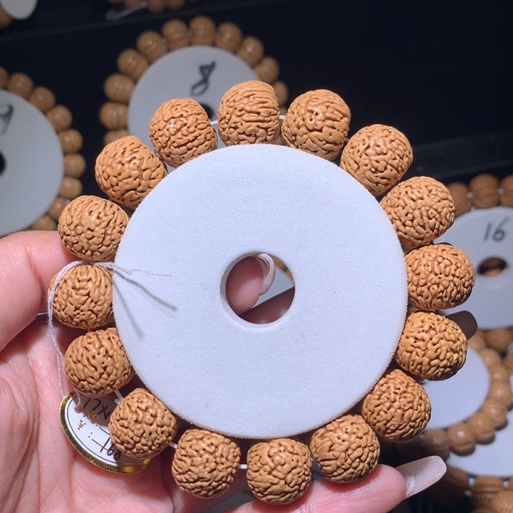 桃核手串正圆龙鳞王