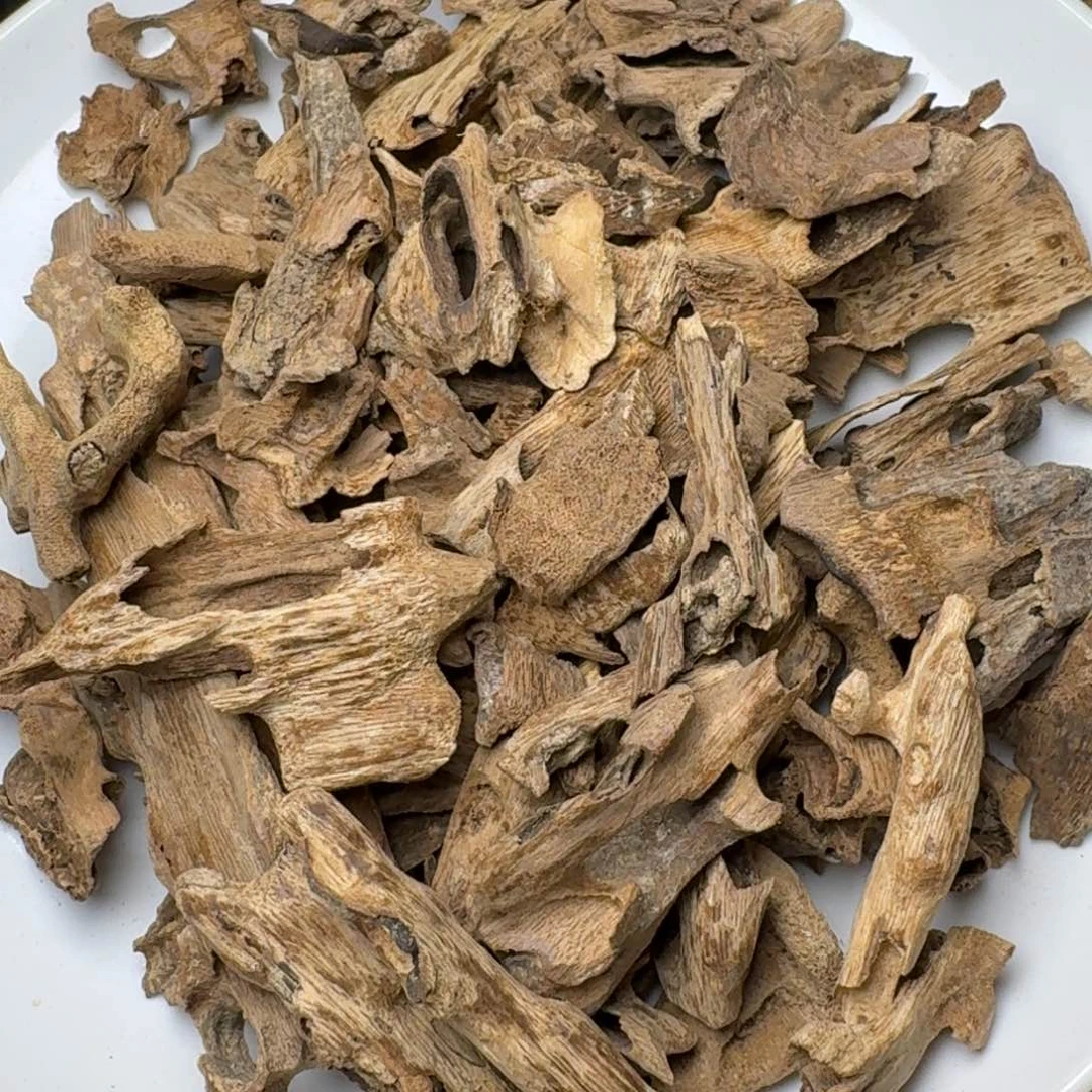 沉香手把件黄***丨香港天然野熟结土沉虫漏块料153克