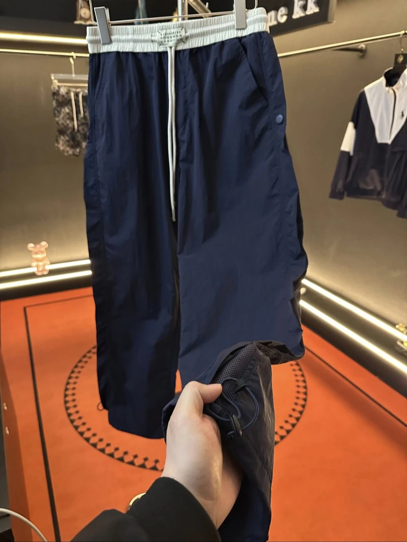 YY1夏季薄款男士网眼速干休闲潮牌百搭户外拼色扣子装饰直筒长裤