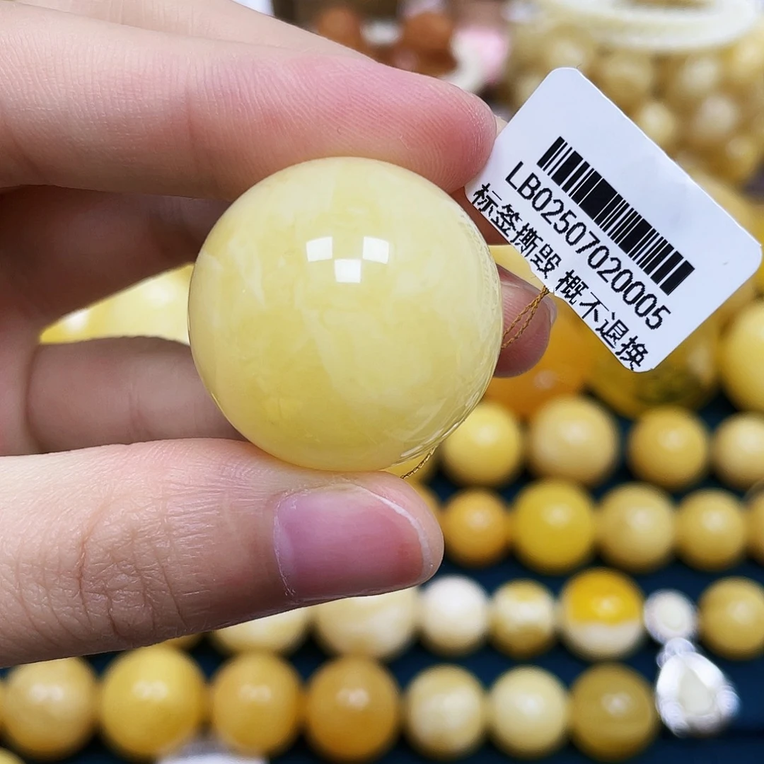 琥珀未镶嵌裸石27.3mm.瑕