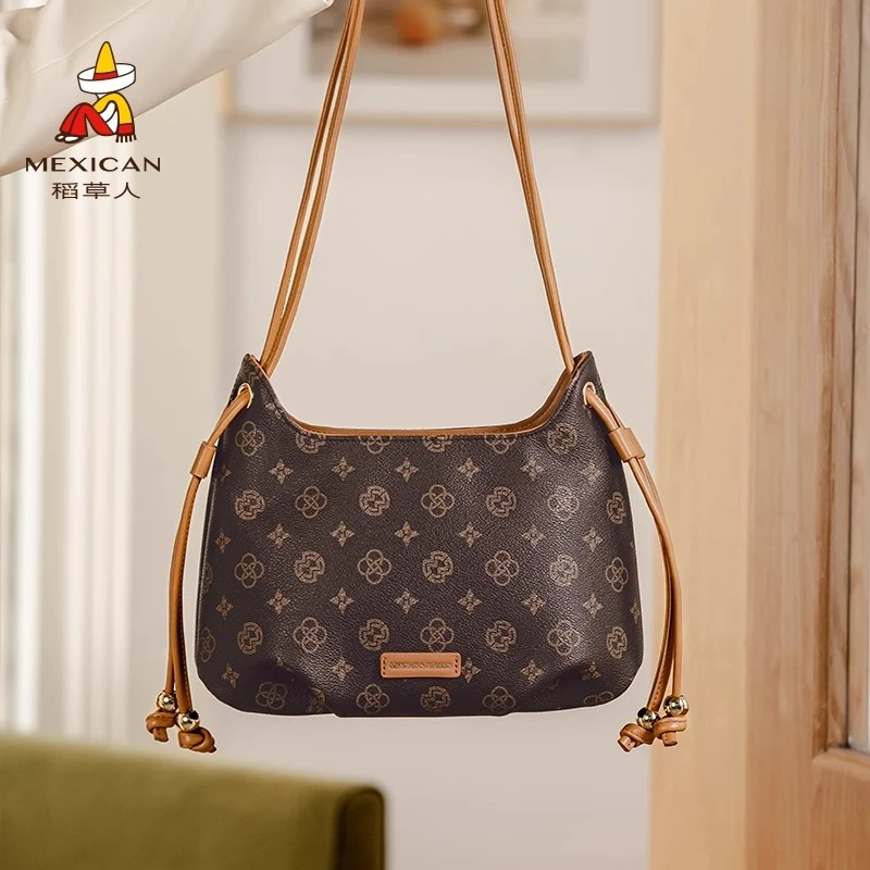 稻草人包包女2025新款高级感通勤水桶包小众时尚大容量单肩斜挎包