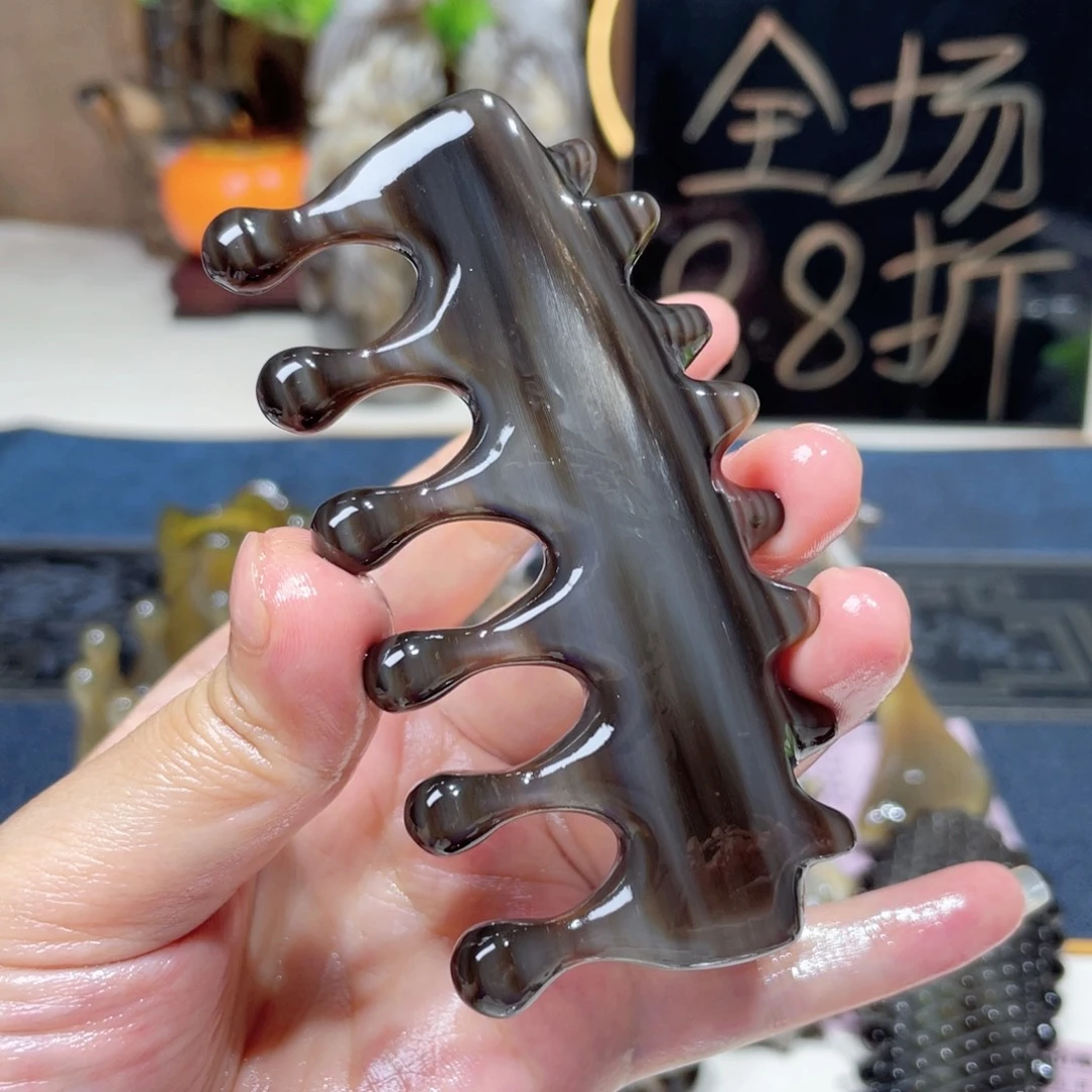 白水黑金刚水滴按摩梳
