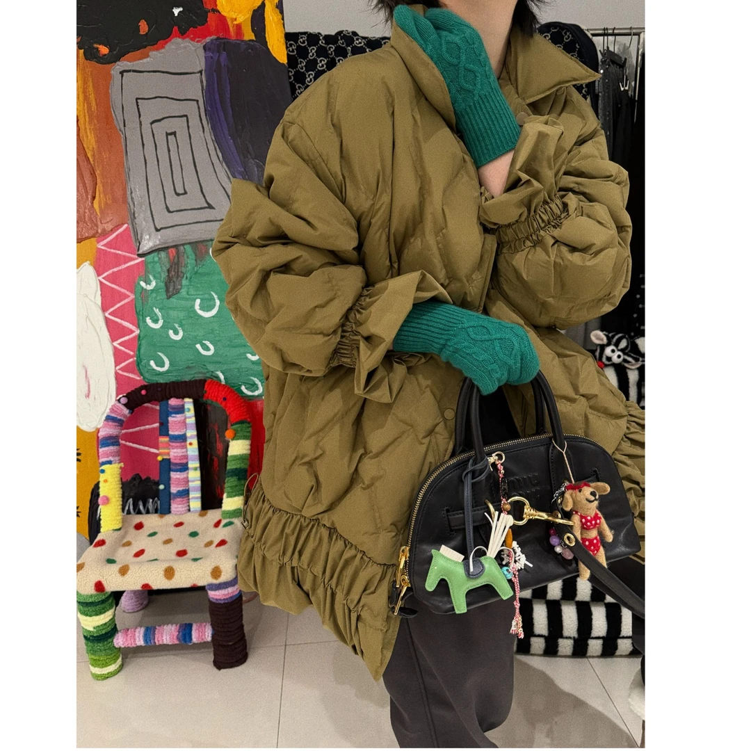 两面穿下摆抽绳花苞羽绒服 J24W465