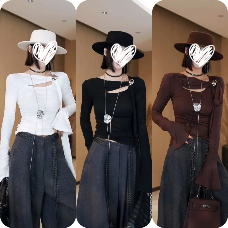 2025年秋季新款设计感不规则镂空喇叭袖显瘦修身纯欲气质女上衣潮