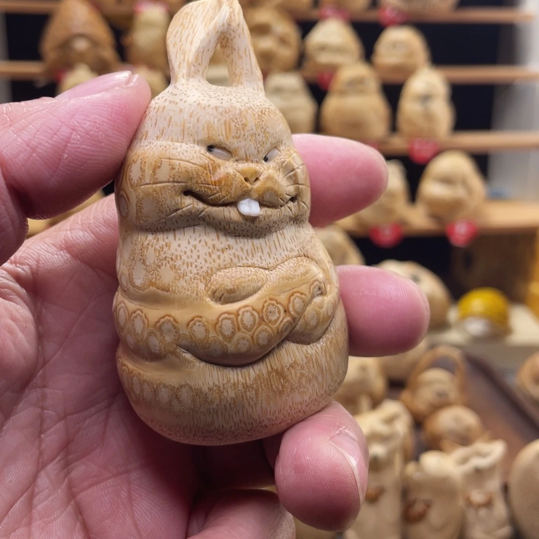 鹿***o竹竹根雕兔子手把件