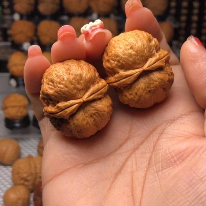 橄榄核把件60玉面鹦鹉