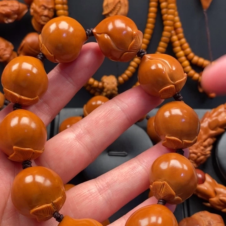 视***铺手串橄榄核21桃子