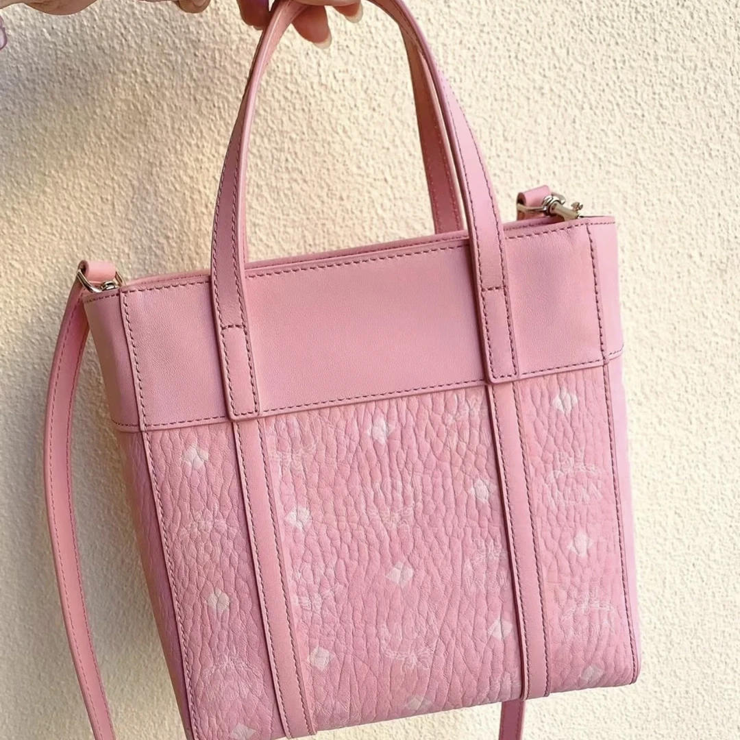 95新 MCM XM/轻雾粉满印logo菜篮子手提斜跨包/SP03104642