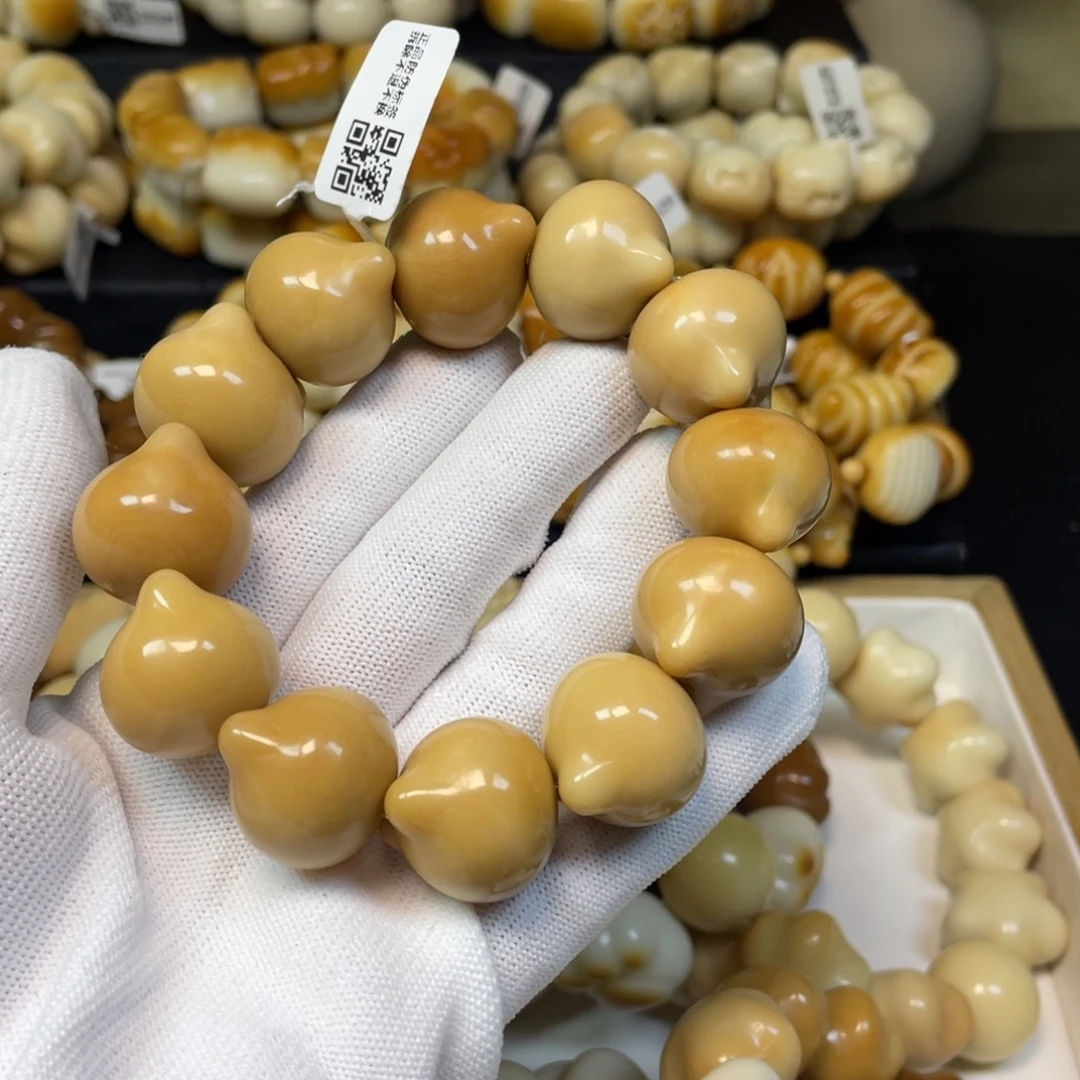 菩提根/象牙果手串112风化猫头微瑕