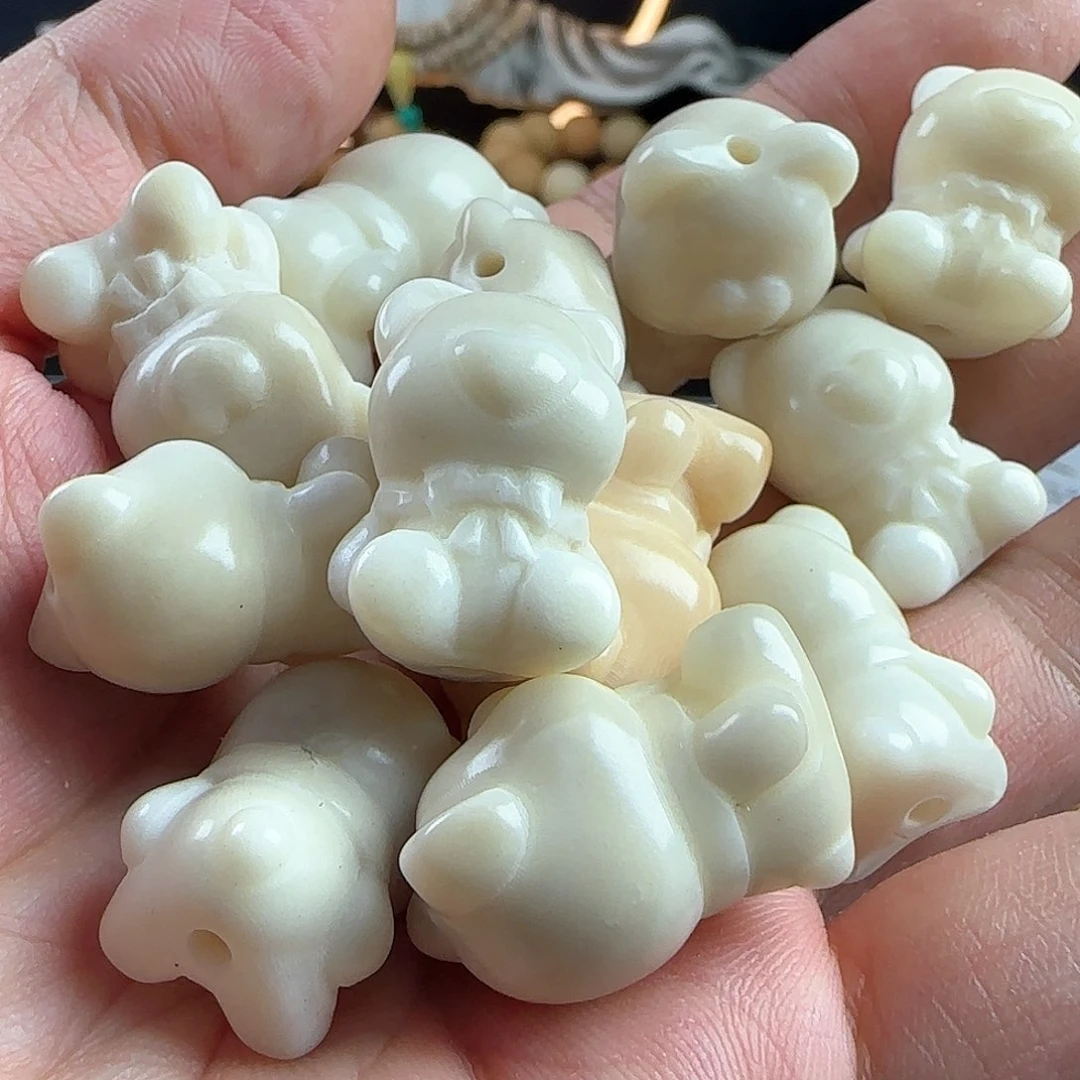 菩提根/象牙果手串瑕疵白色熊5颗不挑瑕疵有裂
