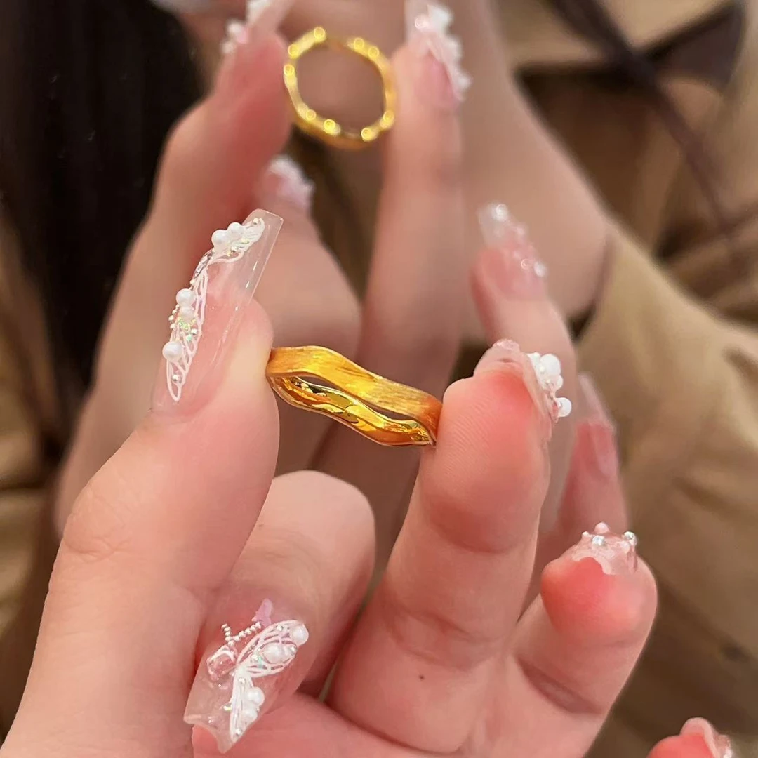 妮蔻黄金足金 莫比乌斯戒指 黄金戒指时尚固定圈口 黄金按克卖