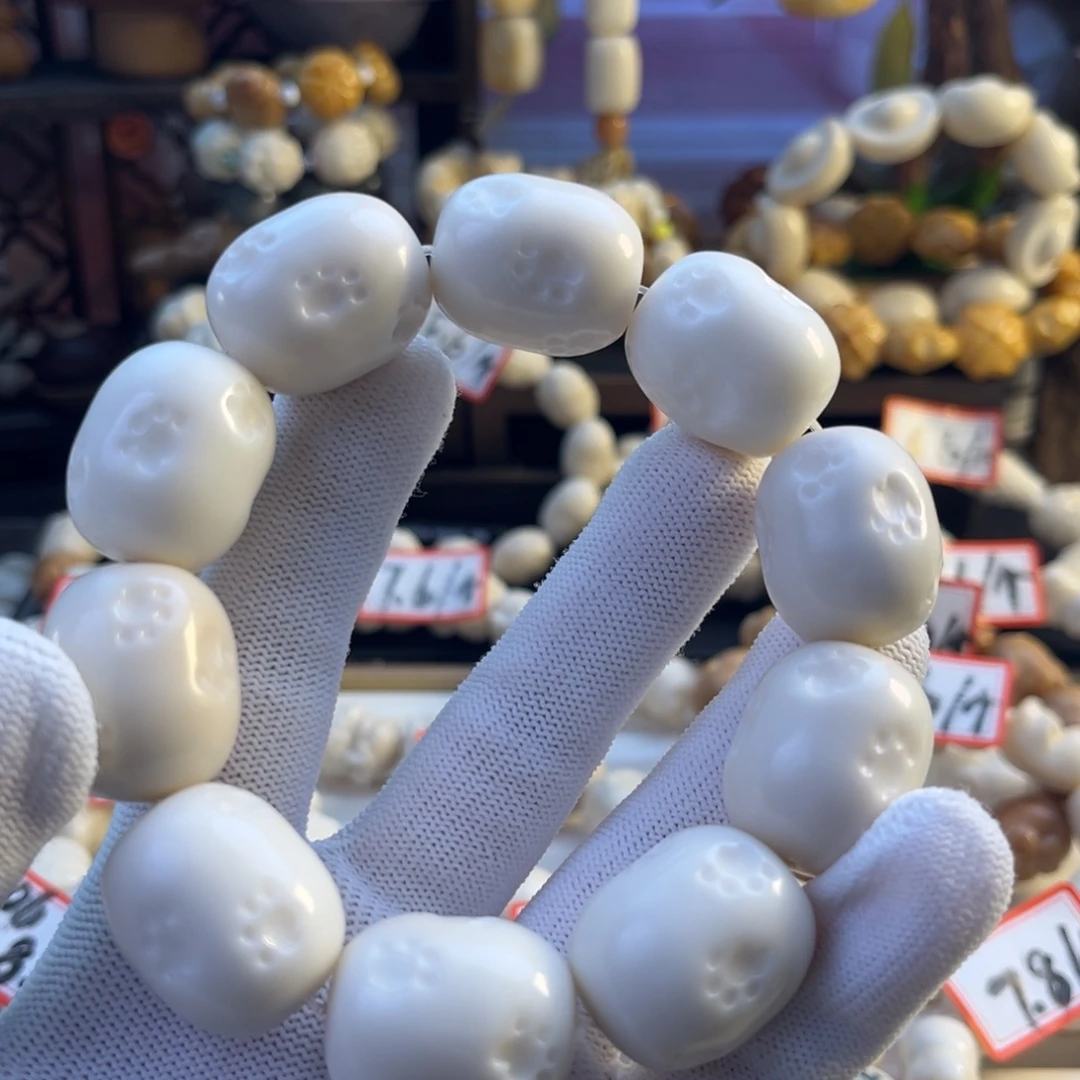 菩提根/象牙果手串-猫爪桶珠