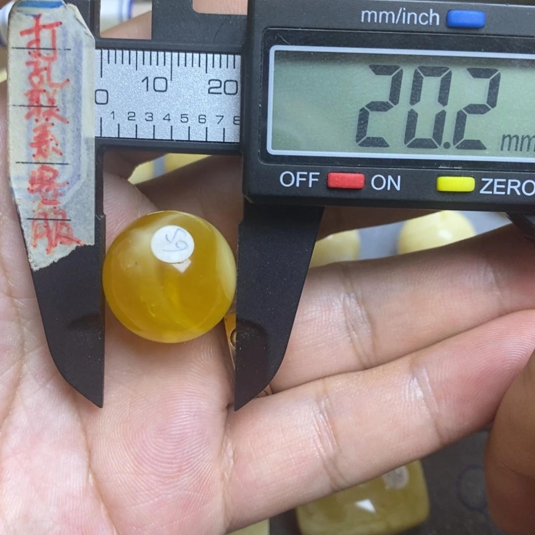 蜜蜡未镶嵌裸石20.2瑕疵圆珠