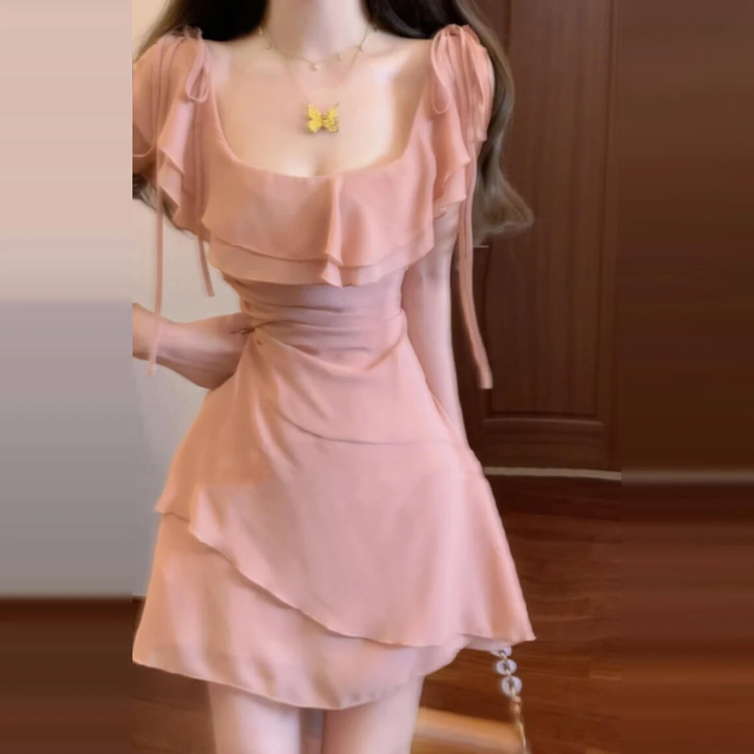 法式荷叶边粉色吊带连衣裙子女夏季2025新款海边度假气质收腰短裙